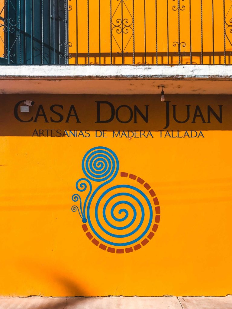 Yellow Building Of Don Juan's Wood Workshop In San Martín Tilcajete