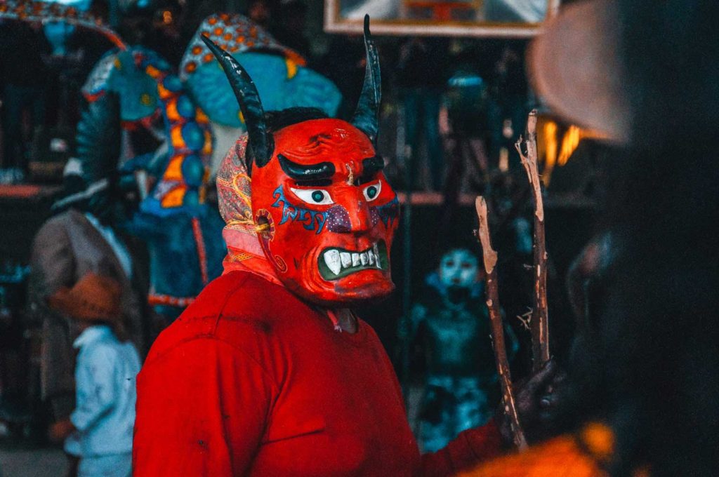 Man Wearing Red Demon Mask In A Carnival In San Martin Tilcajete, Oaxaca