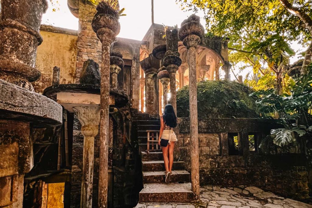 Travel blogger Himanshi Shah walking in the steps of a structure in Las Pozas, Xilitla México