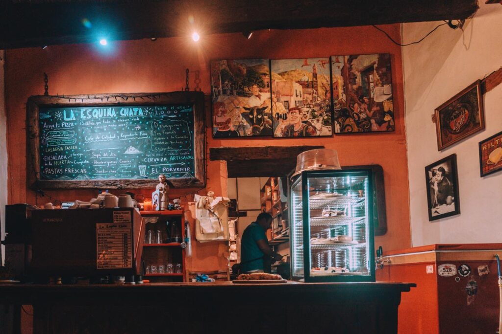 Manager at the counter of La Esquina Chata Restaurant in Real de Catorce