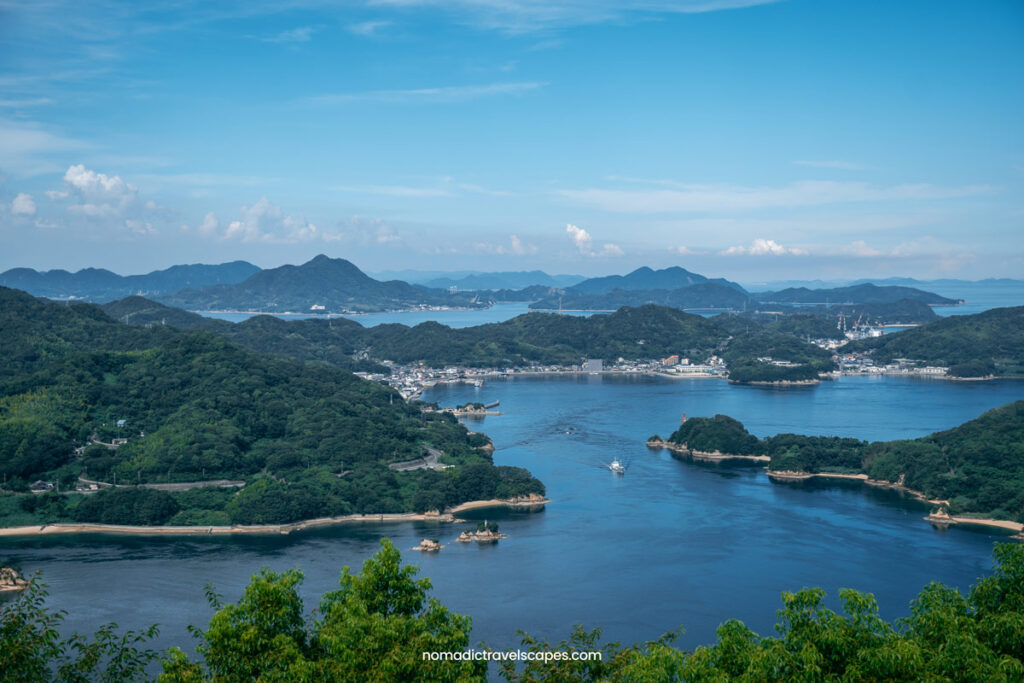 Top view of Seto Islands from Kirosan Observatory Park with blue waters and green lush trees.